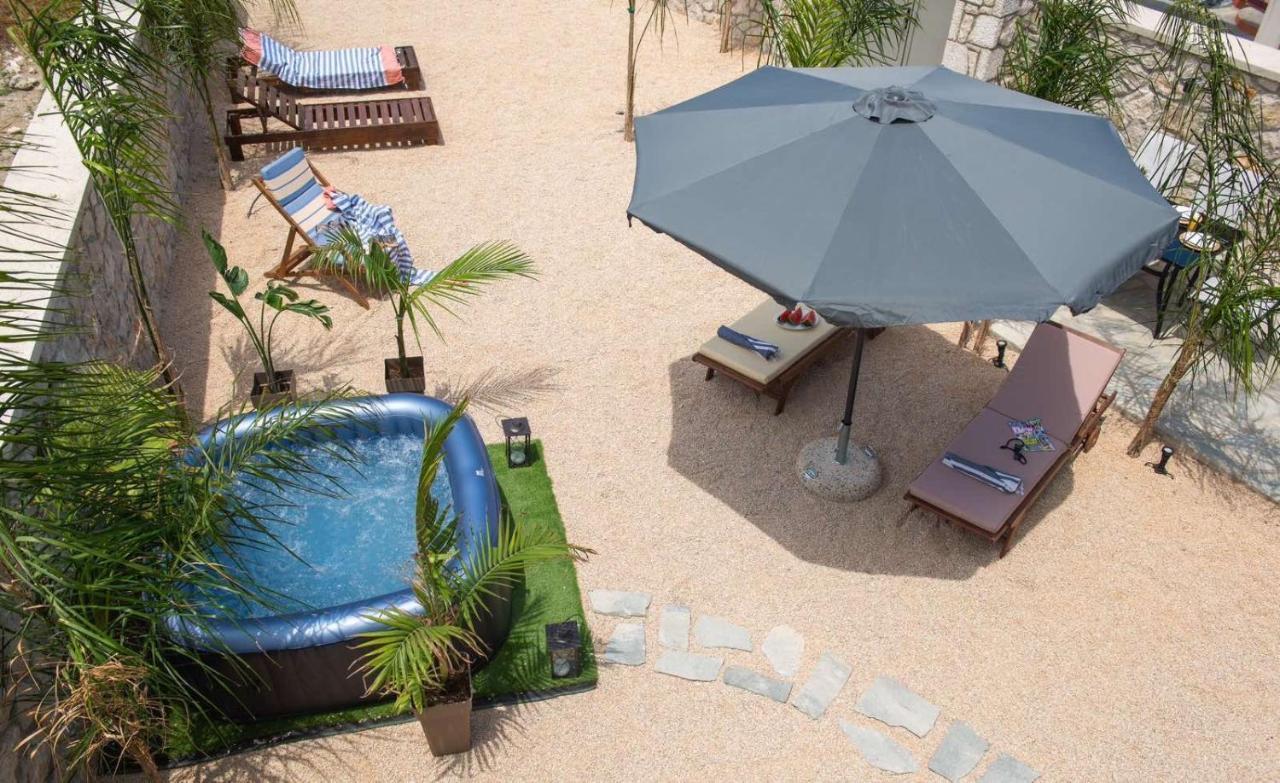 Odyssea Top View & Hot Jacuzzi Front Beach เกรมาสตี ภายนอก รูปภาพ